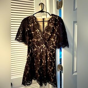 It’s a play suit so  looks like a dress with a shorts type bottom.